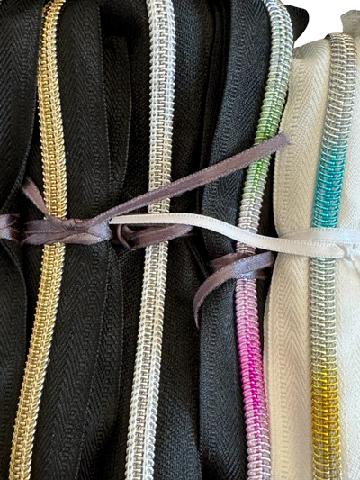 Kit cremalleras nylon blancas y negras con dientes metalizados