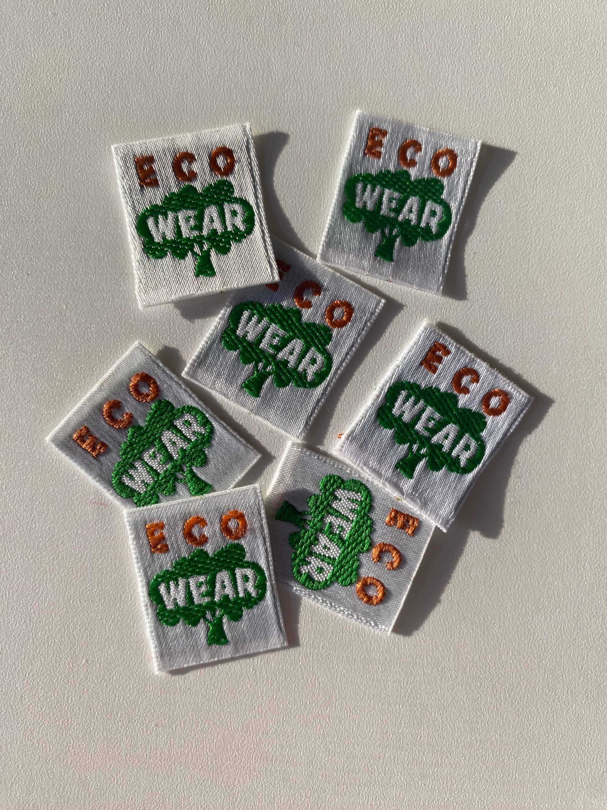 Etiqueta termoadhesiva tejida ECO WEAR