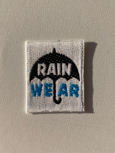 Etiqueta termoadhesiva tejida RAIN WEAR