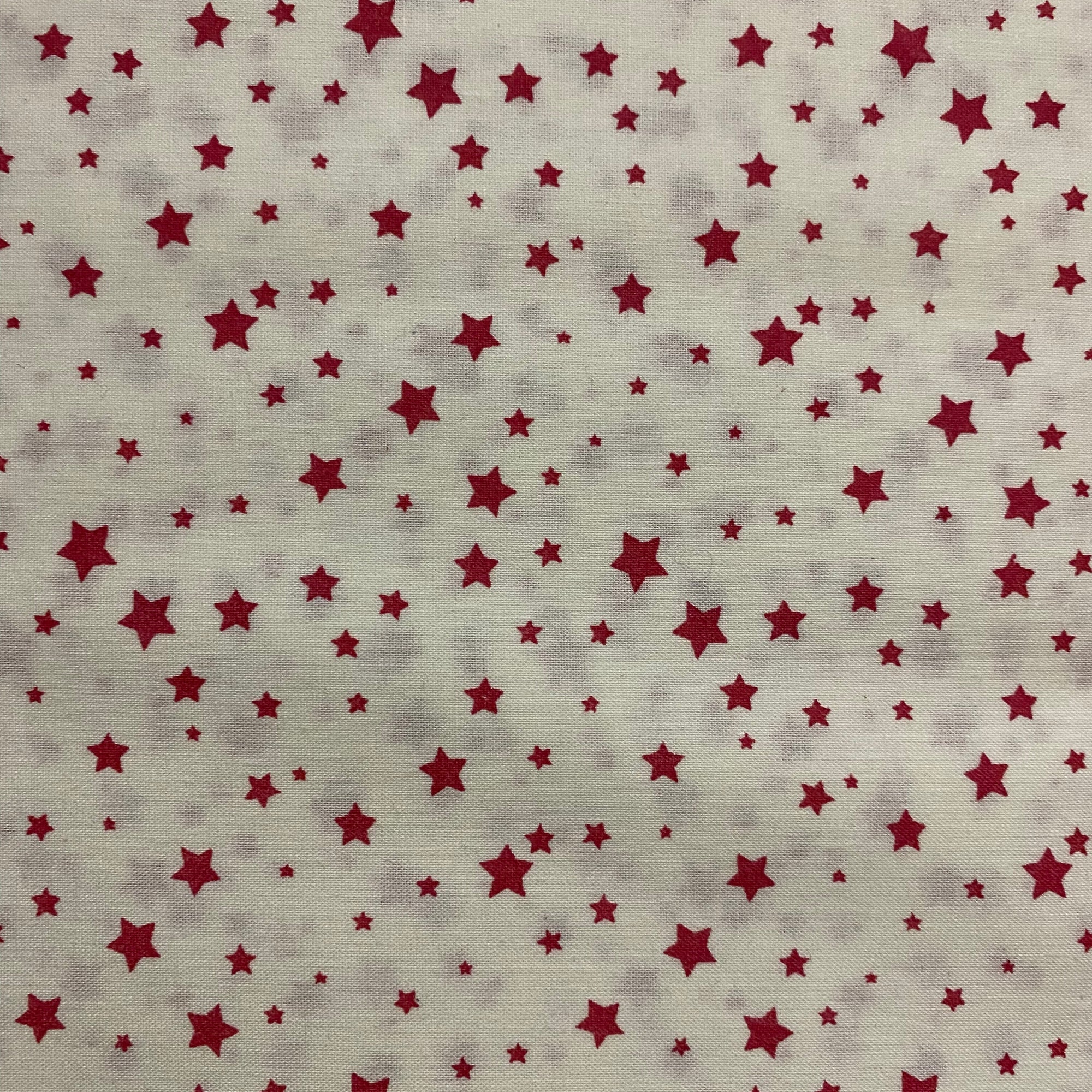 TELA POPELÍN ALGODÓN NAVIDAD ESTRELLITAS ROJAS