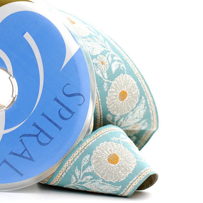 Cubrecosturas flor campestre