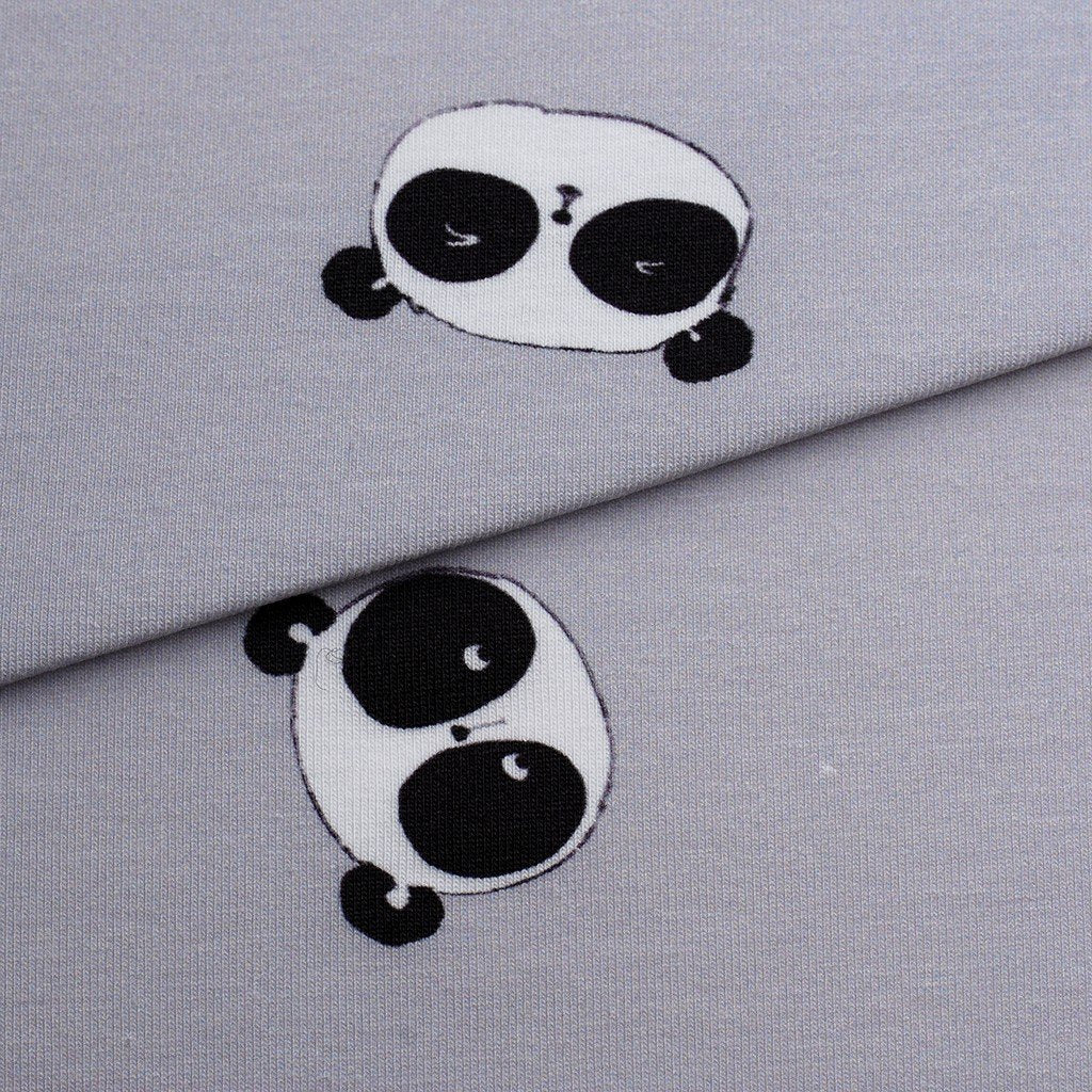 Tela punto estampado pandas