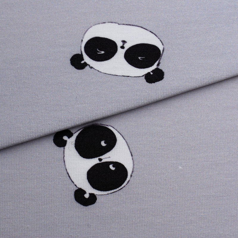 Tela punto estampado pandas