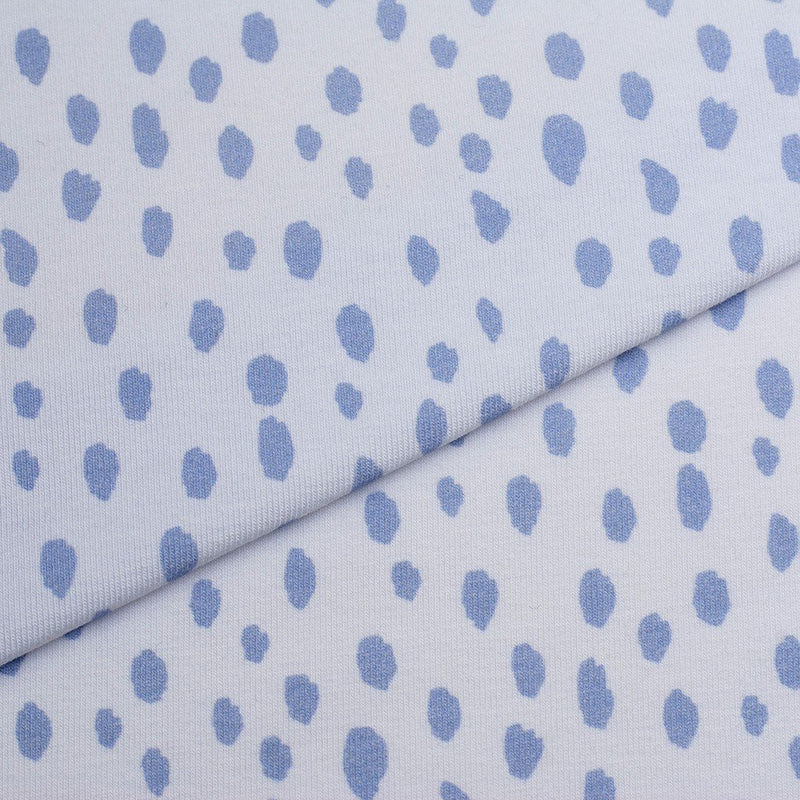 Tela punto estampado manchas