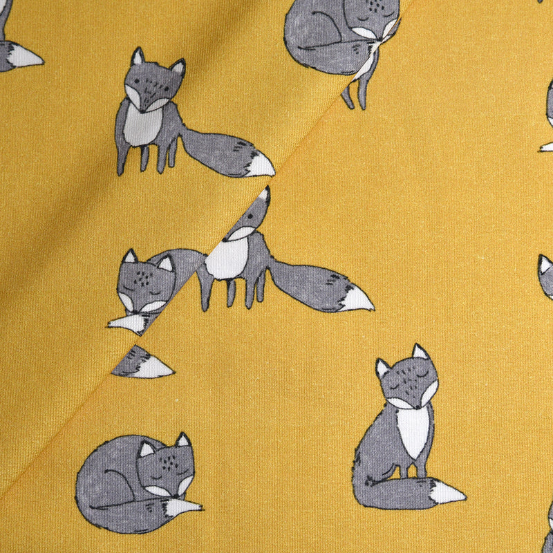 Tela punto estampado zorros ocre/mostaza (CM)