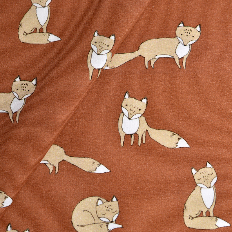 Tela punto estampado zorros marrón/teja (CM)