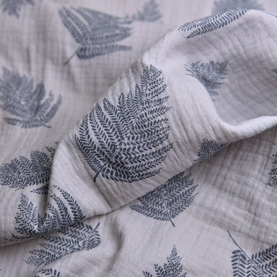 Tela doble gasa/muselina orgánica estampado hojas azul denim (cm) CERTIFICADO GOTS