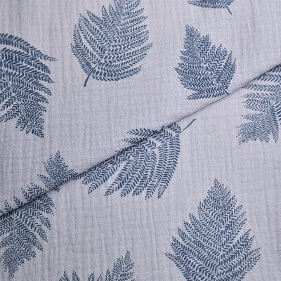Tela doble gasa/muselina orgánica estampado hojas azul denim (cm) CERTIFICADO GOTS