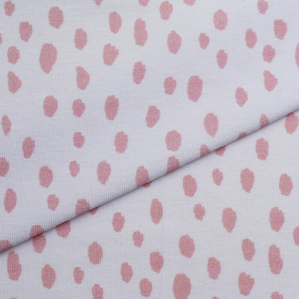 Tela punto estampado manchas