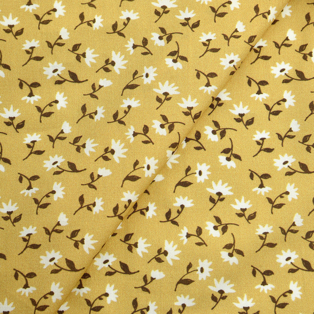Tela 100% algodón estampado flores amarillo CERTIFICADO GOTS (CM)